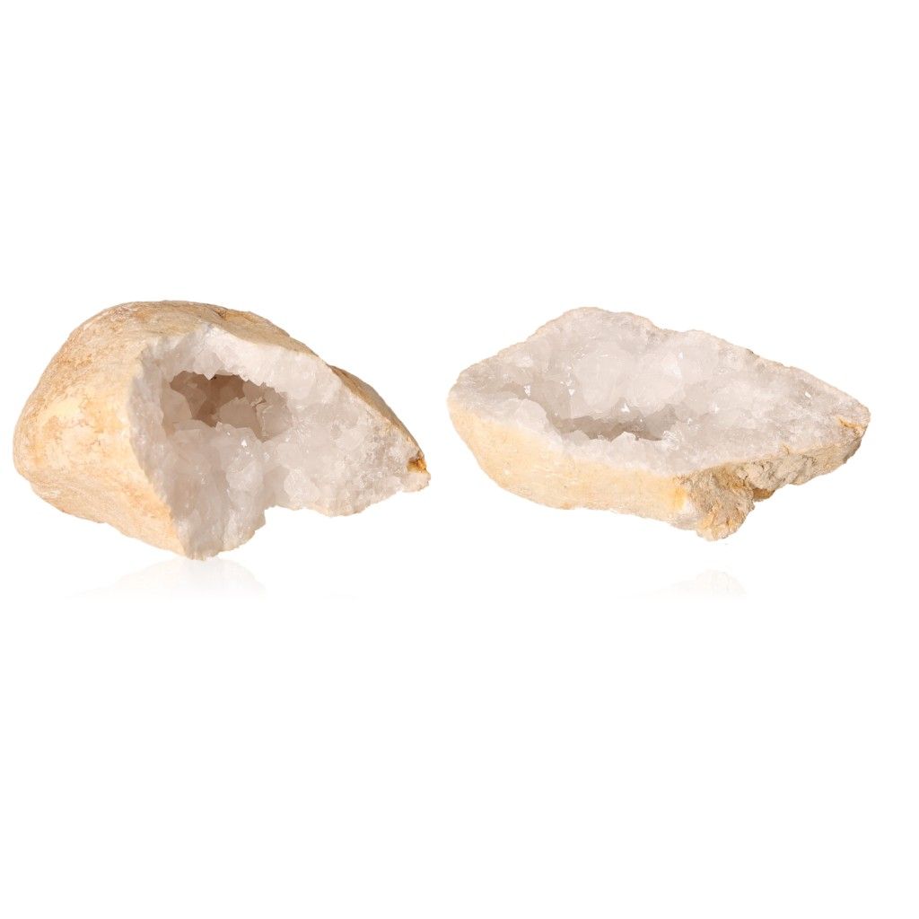 Milky quartz geode halves revealing sparkling cloudy white crystals, perfect for energy balancing and enhancing tranquility.