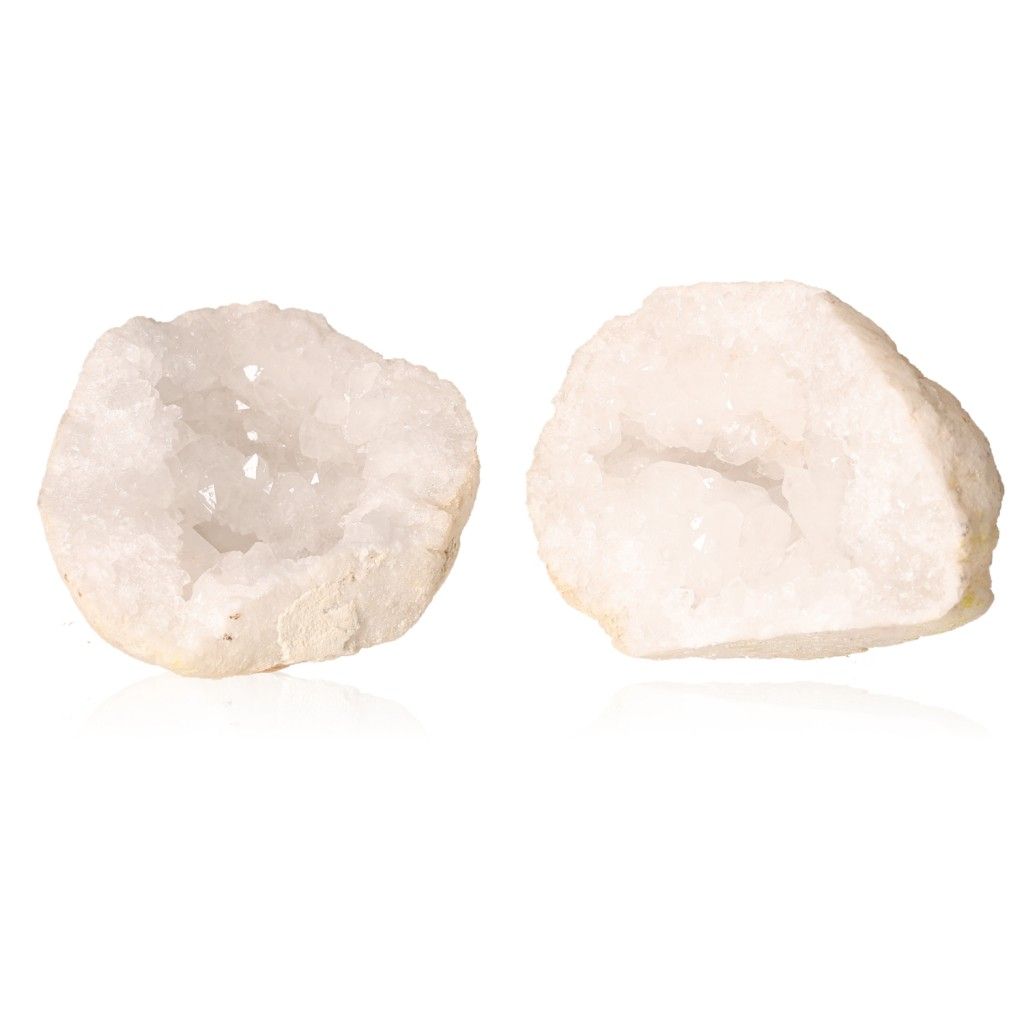 Quartz geode with cloudy white crystals, known for amplifying energy and promoting tranquility, against a white background.