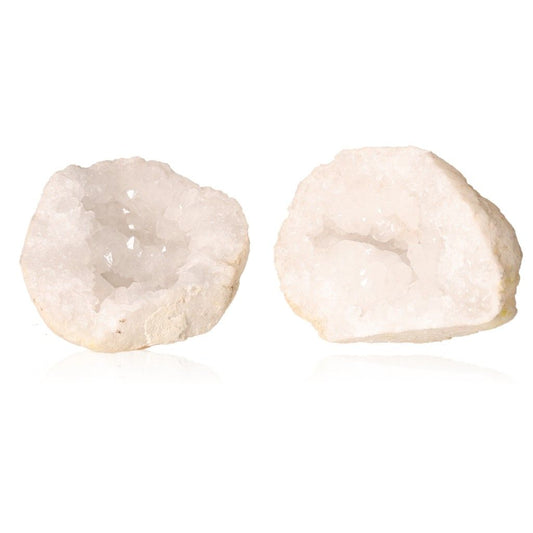 Quartz geode with cloudy white crystals, known for amplifying energy and promoting tranquility, against a white background.