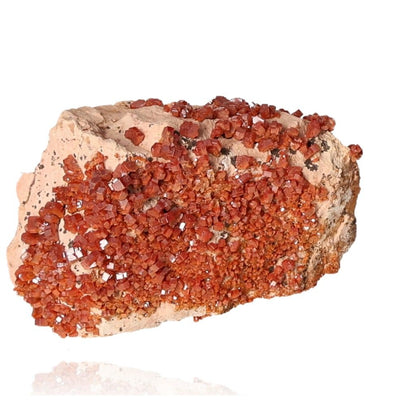 Vanadinite Druze with reddish-brown hexagonal crystals and a glassy surface, enhancing focus and motivation.