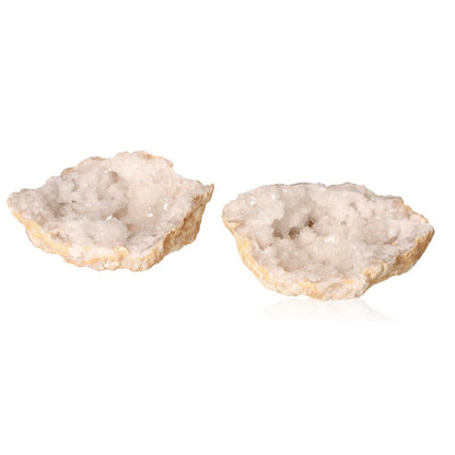 Milky quartz geodes with rugged shell and sparkling cloudy white crystals, ideal for balancing energy and enhancing tranquility.