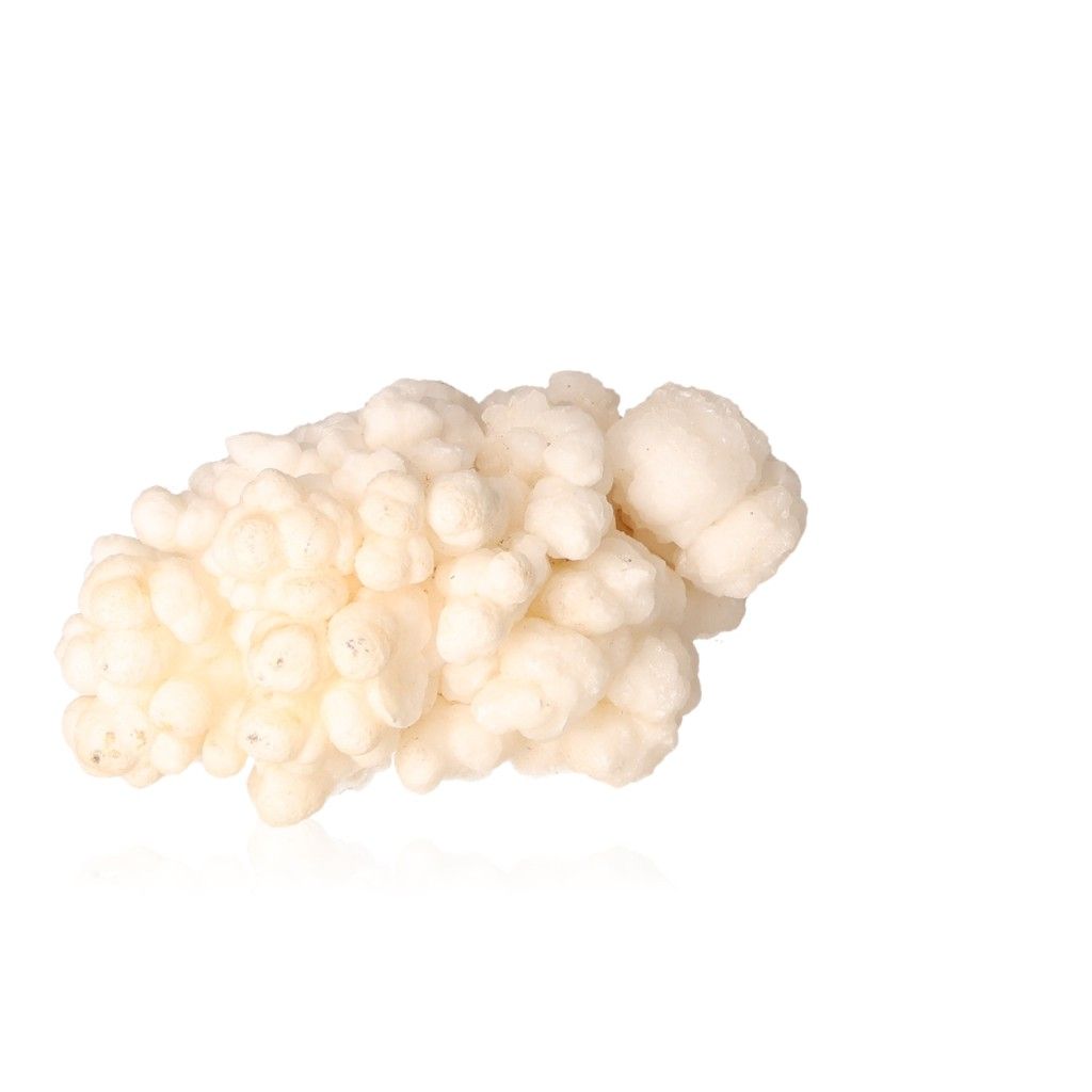 Natural cave calcite stalactite cluster showcasing intricate mineral formations against a white background.