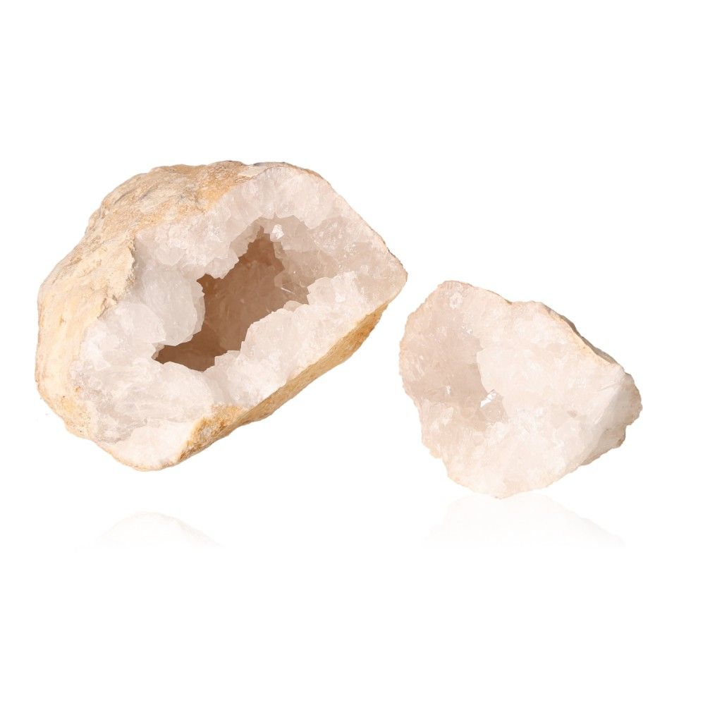 Milky quartz geode with rugged shell and sparkling white crystals, ideal for energy cleansing and promoting focus.