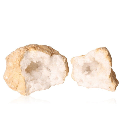 Milky quartz geode with rugged shell and sparkling white crystals, ideal for enhancing tranquility, focus, and positive energy.