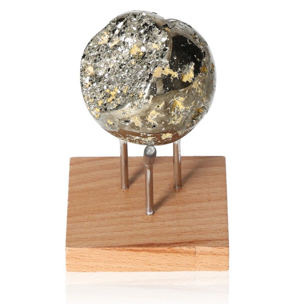 Pyrite sphere on a wooden stand, promotes independence and courage, ideal for motivation and initiative.