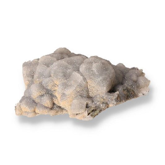 Calcite crystal in natural form, showcasing unique textures and colors, supports various chakras and promotes energetic balance.