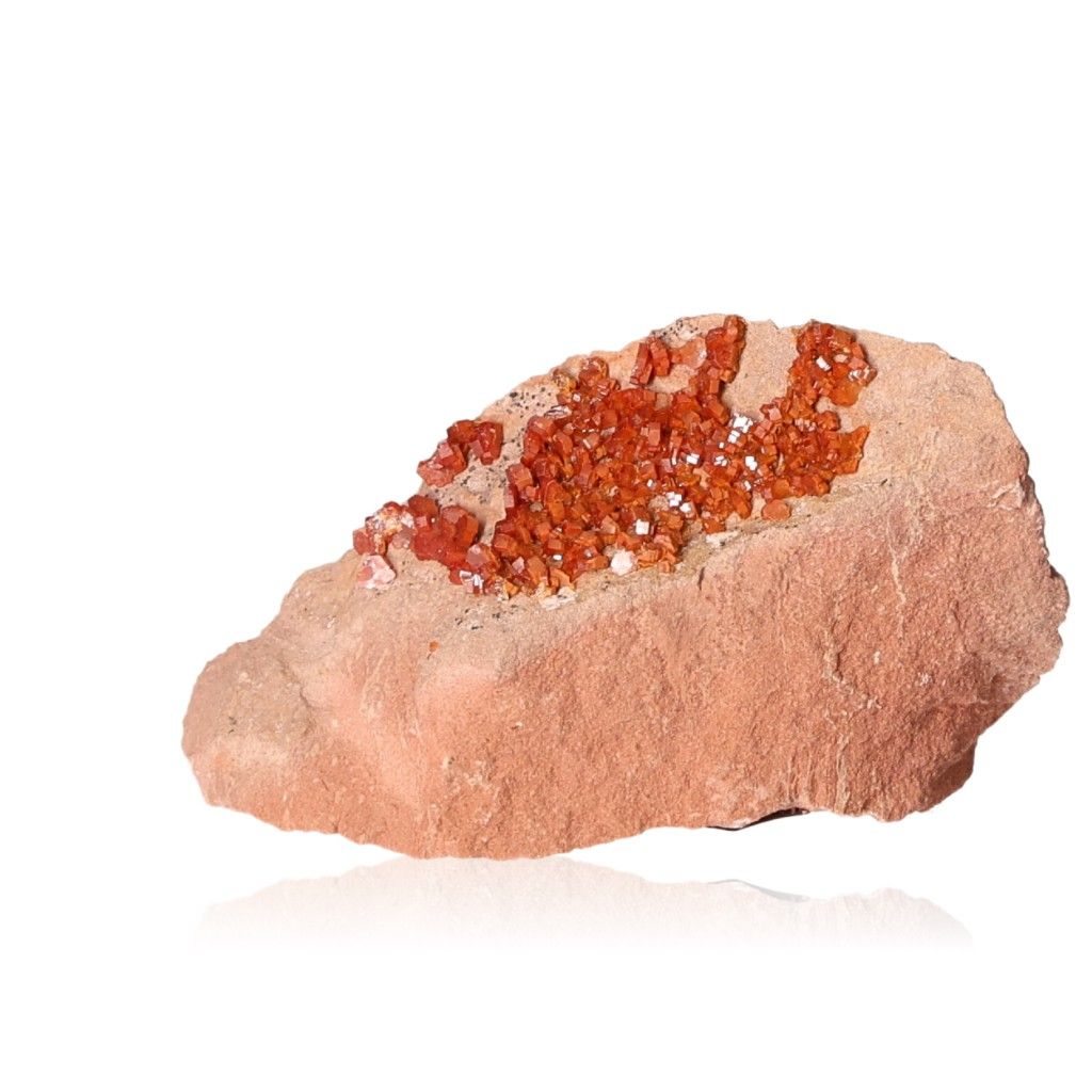 Vanadinite druzy stone for focus and motivation on a white background.