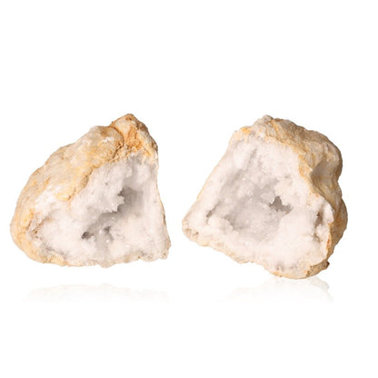 Rugged milky quartz geode split open, revealing sparkling cloudy white crystals, perfect for energy balancing and promoting tranquility.