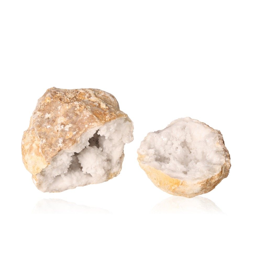 Milky quartz geode split open showing sparkling white crystals, ideal for energy cleansing and promoting tranquility and clarity.