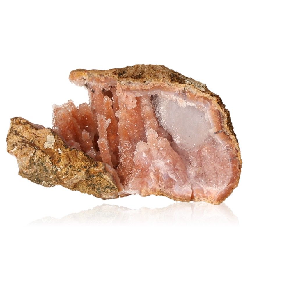 Calcite stalactite showcasing pink, earthy tones and intricate layers, symbolizing growth, energy, and natural beauty.