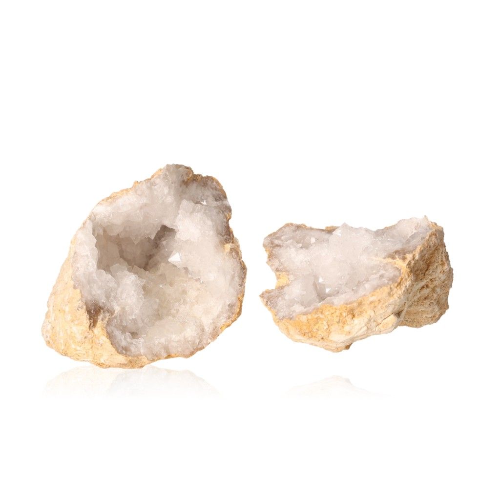 Milky quartz geode showcasing rugged exterior and sparkling white crystals, ideal for energy balance and positive vibes.