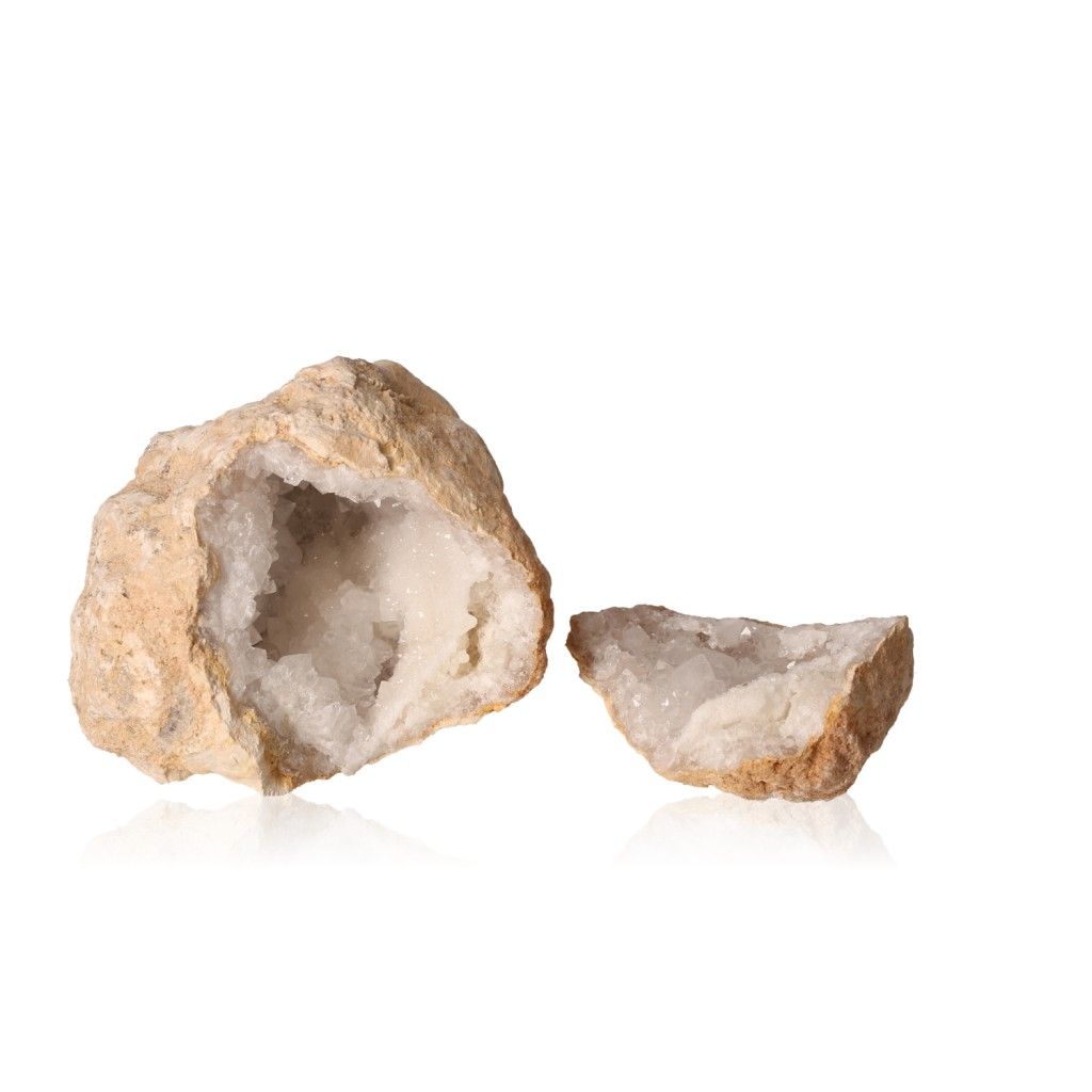 Milky quartz geode revealing sparkling white crystals, ideal for energy cleansing and enhancing tranquility.