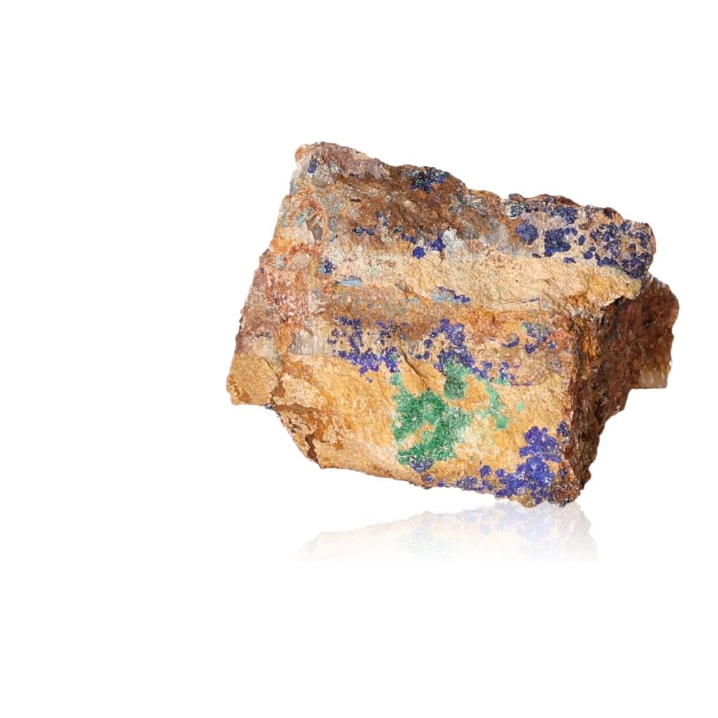 Raw malachite druze stone with vibrant green and blue mineral deposits on a white background.