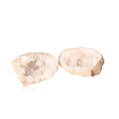 Milky quartz geode with a rugged shell revealing sparkling, cloudy white crystals, known for enhancing tranquility and clarity.