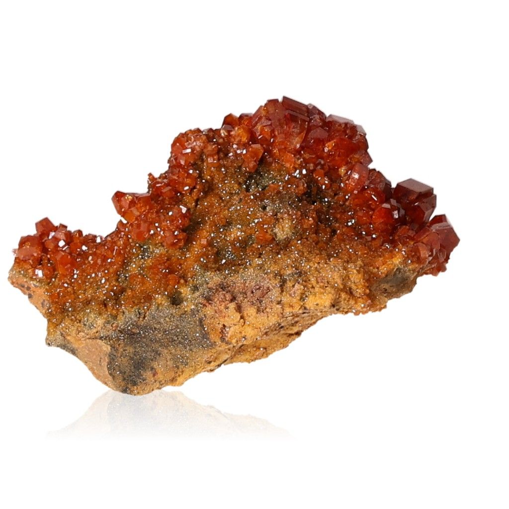 Vanadinite Druze with reddish-brown hexagonal crystals and a glassy surface, promoting focus and motivation.