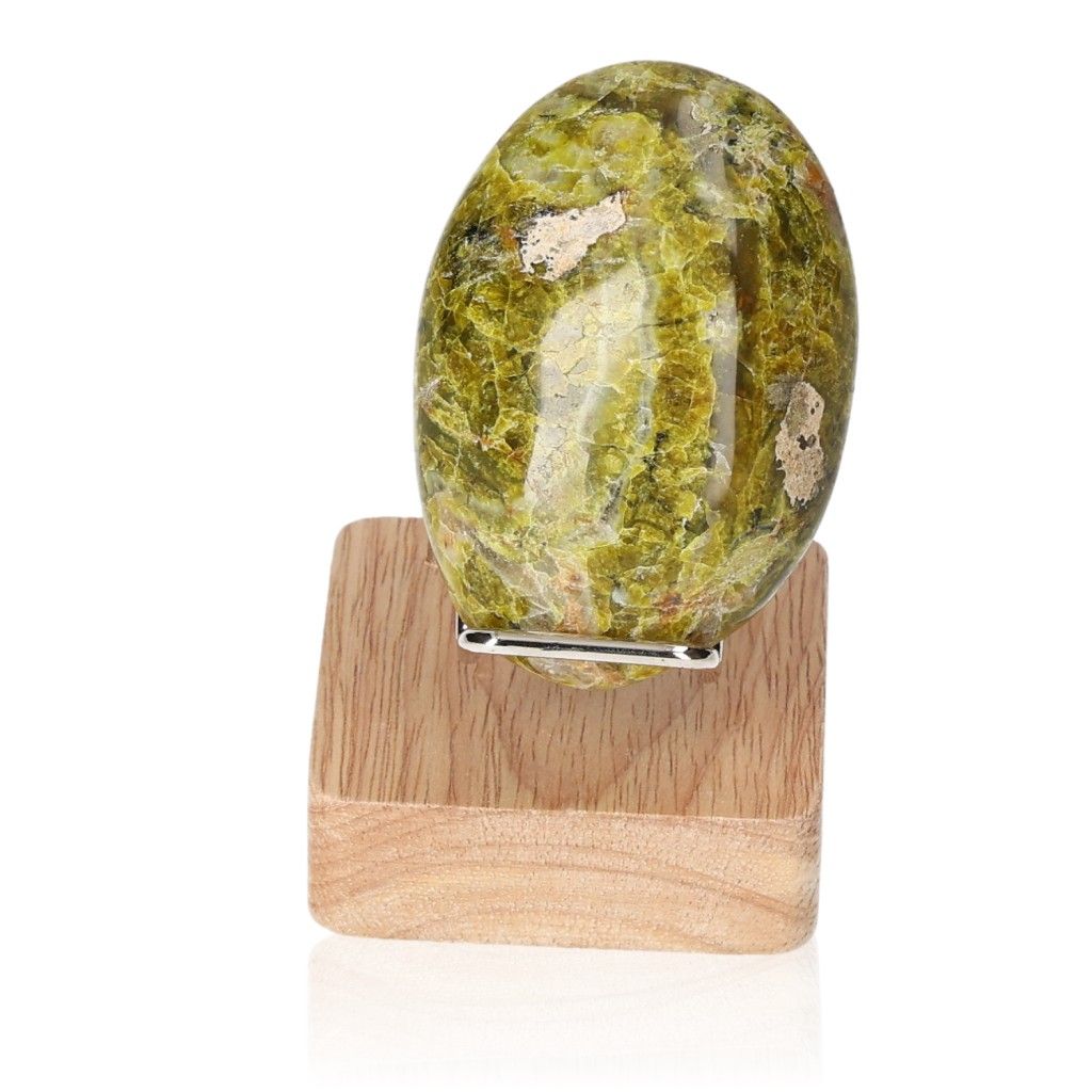 Green Opal Freeform on wooden base, showcasing its soft green hues and healing energy for renewal and emotional balance.