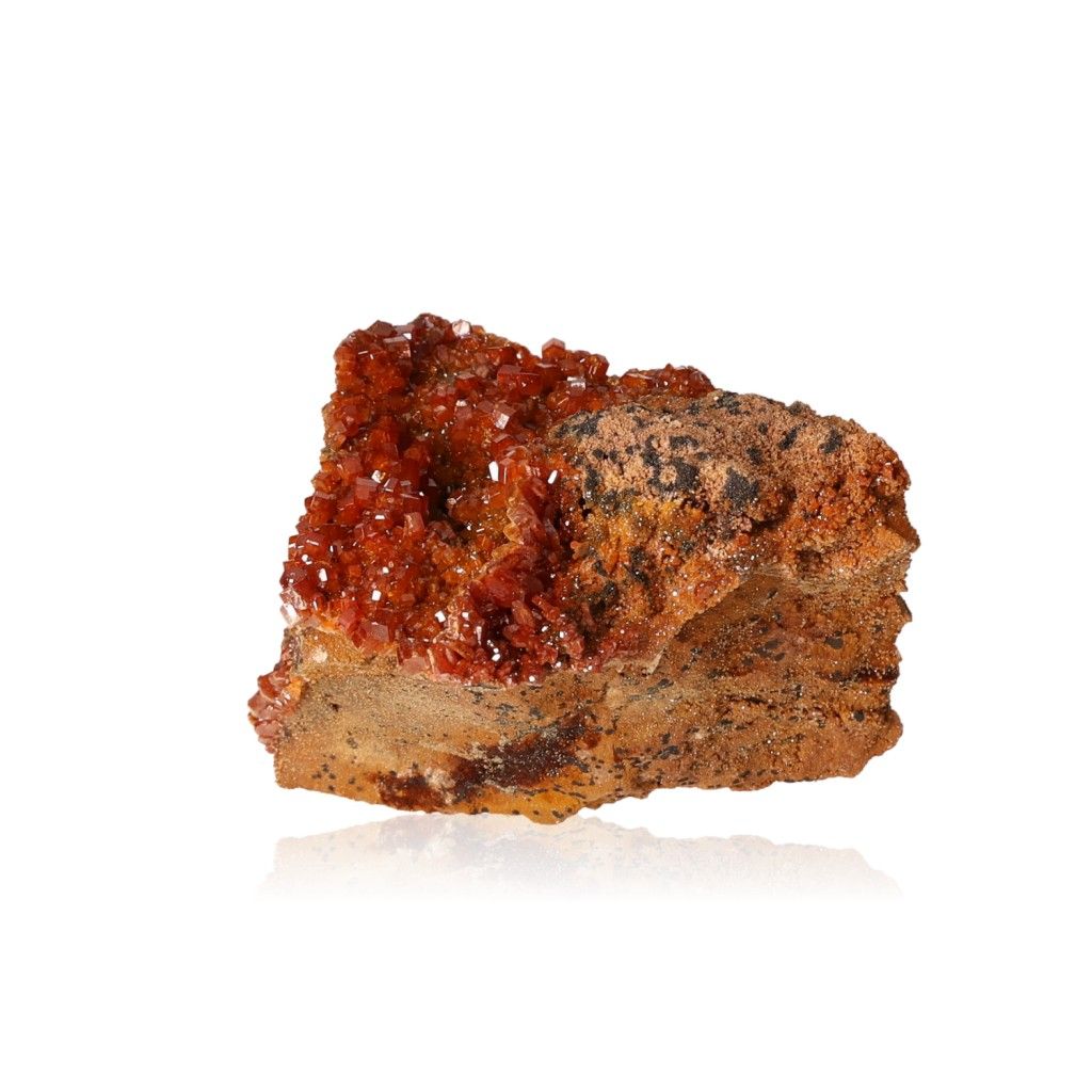 Vanadinite druzy with reddish-brown hexagonal crystals and a glassy surface, enhancing focus and motivation.