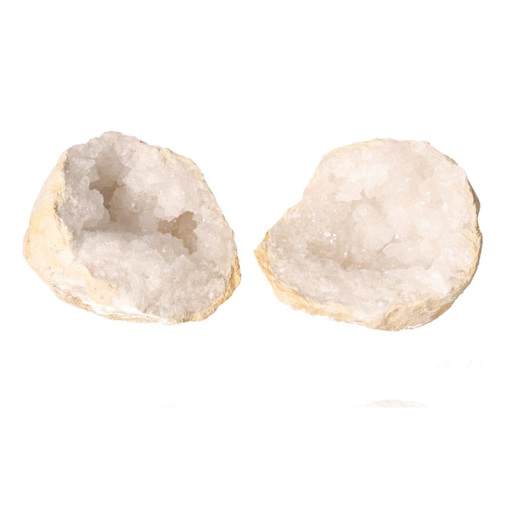 Quartz geode split open displaying sparkling white crystals and rough outer shell, ideal for energy balance and positive vibes.