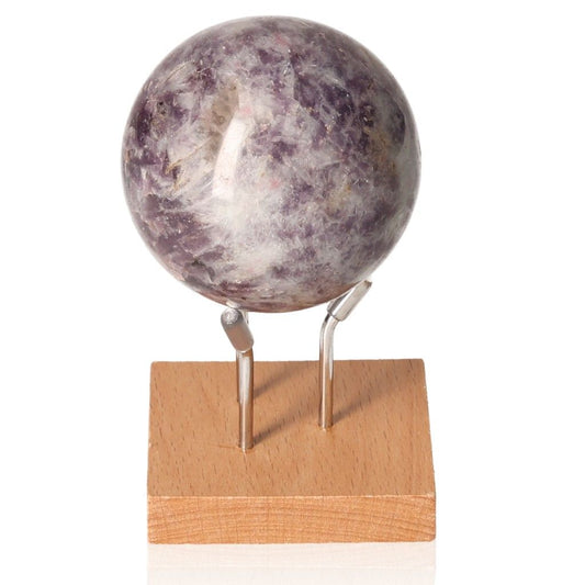 Lepidolite sphere on stand, brings peace and emotional balance, enhances positivity, aids in setting goals, promotes emotional harmony.