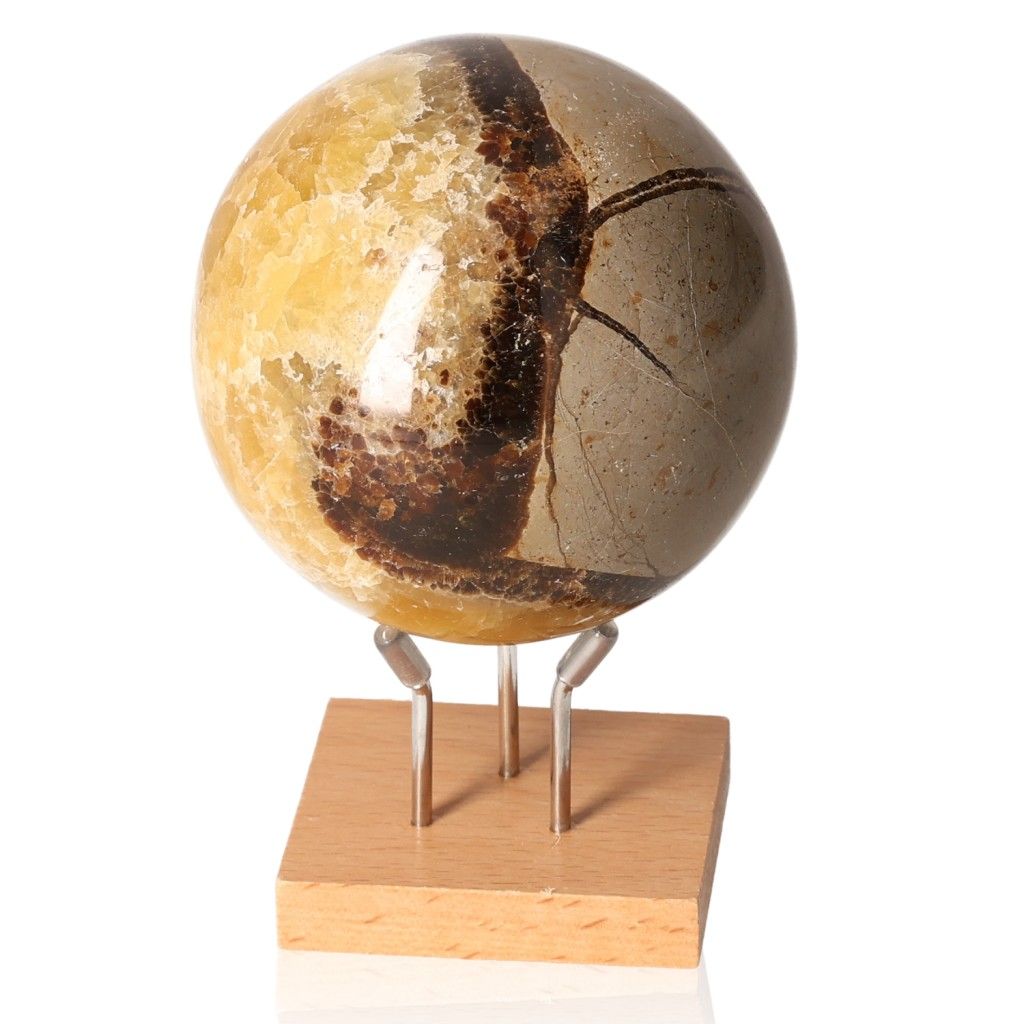 Septarian Sphere on wooden stand, showcasing unique patterns and colors, known for its spiritual and therapeutic properties.