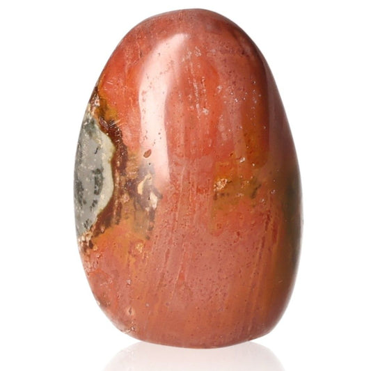 Polychrome Jasper Free Form with vibrant red, orange, and green hues known for its grounding properties and dynamic color patterns.