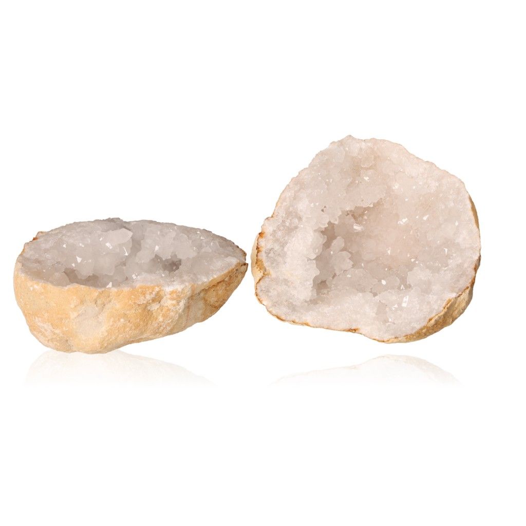 Milky quartz geode with rugged shell and sparkling crystals, enhances clarity and tranquility, perfect for balancing energy.