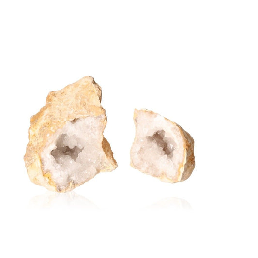 Milky quartz geode pair with sparkling cloudy white crystals, showcasing rugged outer shell and enhancing tranquility and positive energy.