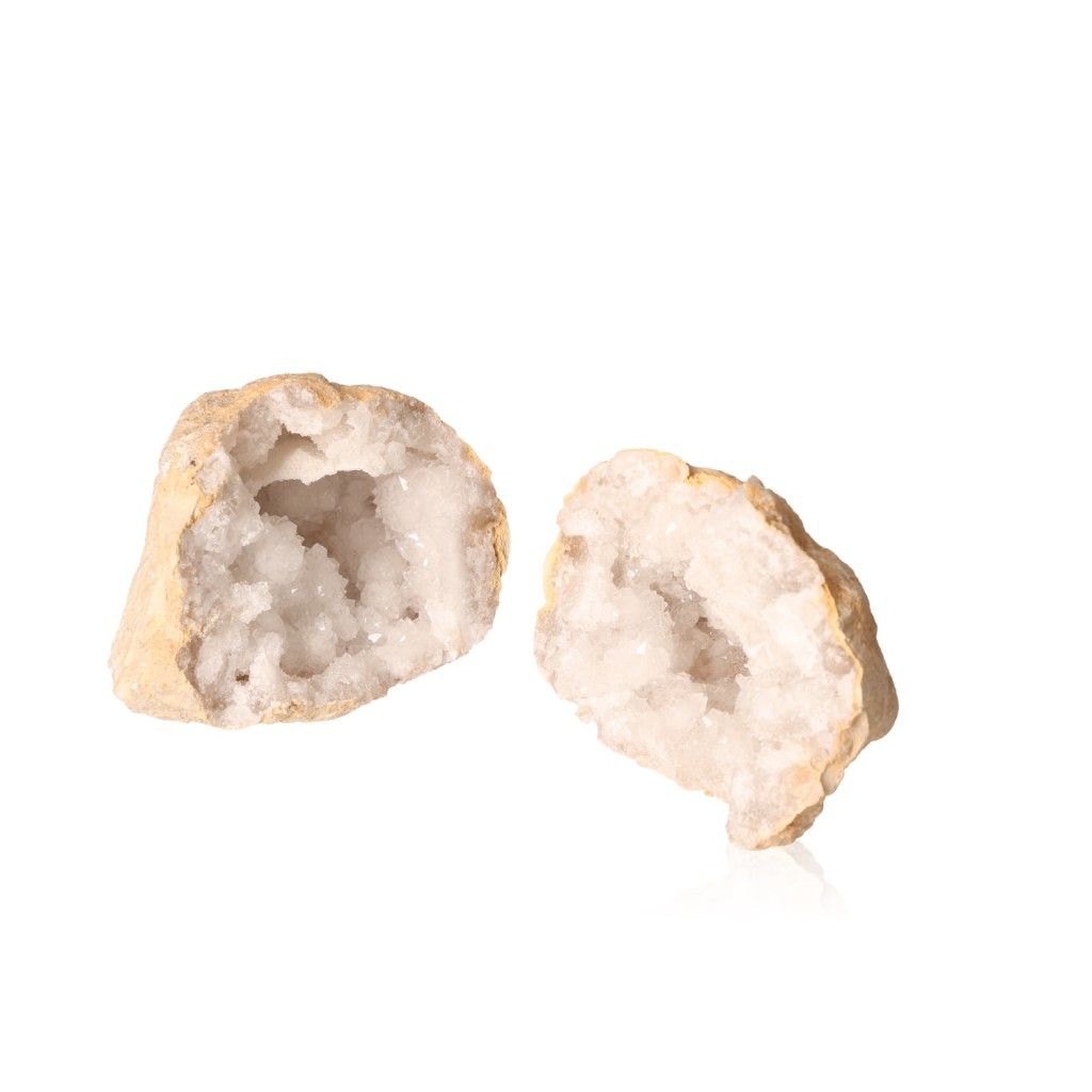 Milky quartz geode with sparkling white crystals, enhancing tranquility and positive energy, perfect for focus and balance.