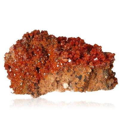 Vanadinite Druze with vibrant reddish-orange hexagonal crystals on a rocky base, enhancing focus and motivation.