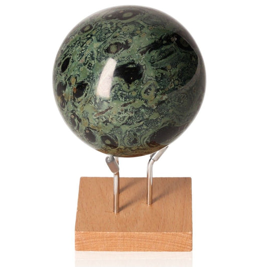 Kambaba Jasper Sphere on stand showcasing its green and black mesmerizing patterns, known as the Stone of Peace for calm and harmony.