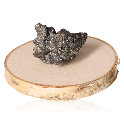 Pyrite druze crystal on wooden base, enhancing independence and inspiring new ideas for personal growth and goal achievement.