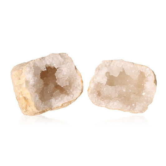 Milky quartz geode halves with cloudy white crystals, showcasing rugged outer shell and sparkling interior for energy balance.