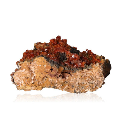 Vanadinite Druze with reddish-brown hexagonal crystals and glassy surface, enhancing focus and motivation.