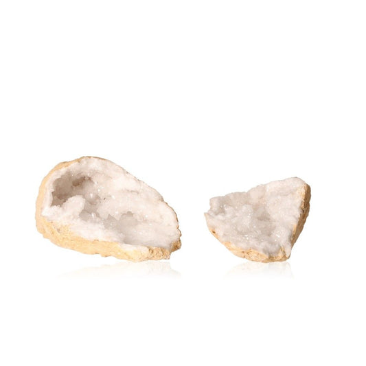 Milky quartz geode with sparkling white crystals, showcasing its earthy shell and promoting tranquility and positive energy.