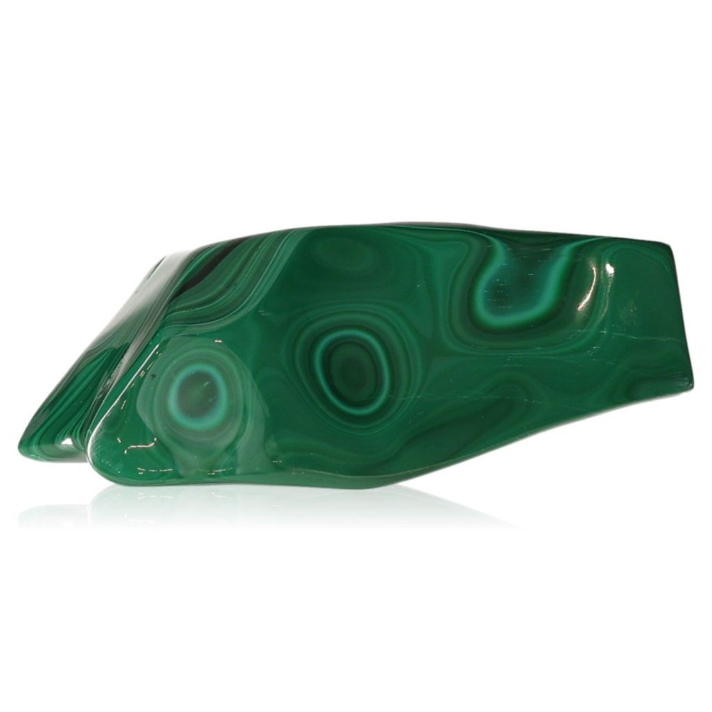 Smooth polished malachite stone with swirling green patterns symbolizing harmony and positivity. Ideal for nature-inspired decor.