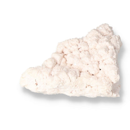 Soft pink Mangano Calcite stone for love and emotional healing.