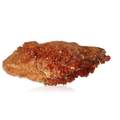 Reddish-brown Vanadinite Druze stone with vibrant hexagonal crystals and a glassy surface, enhancing motivation and personal transformation.