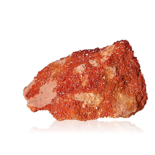 Vanadinite druzy stone, known for enhancing focus and motivation, featuring rich red crystals for personal transformation and resilience.