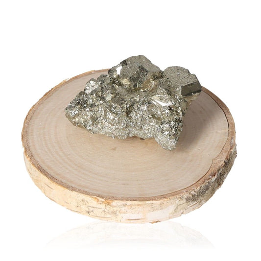 Pyrite druze on wooden disc, a stone that supports independence and inspires new ideas, ideal for motivation and action.