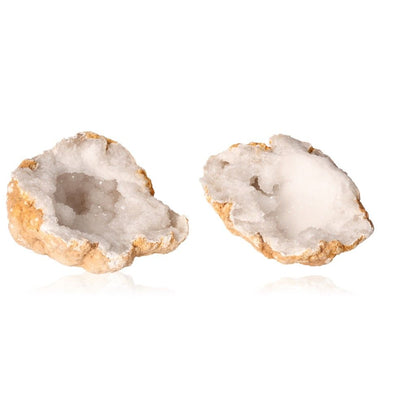 Quartz geode with rugged shell and sparkling white crystals, ideal for enhancing tranquility, balance, and positive energy.