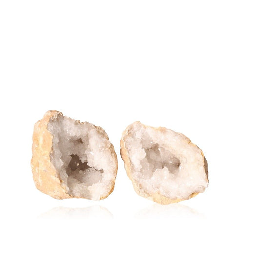 Milky quartz geodes with sparkling white crystals, ideal for balancing energy and promoting tranquility and clarity.