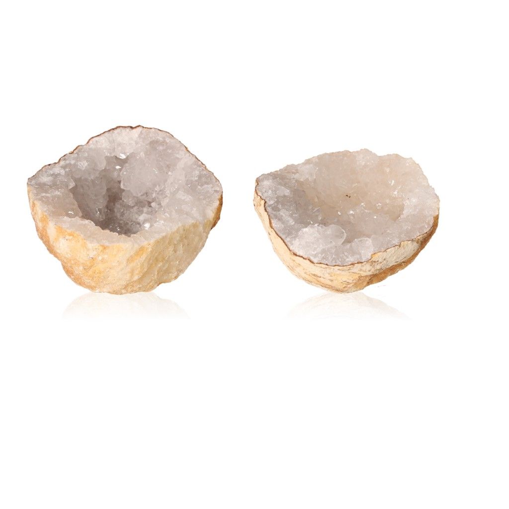 Milky quartz geode showcasing rugged shell and sparkling white crystals for energy purification and balance.