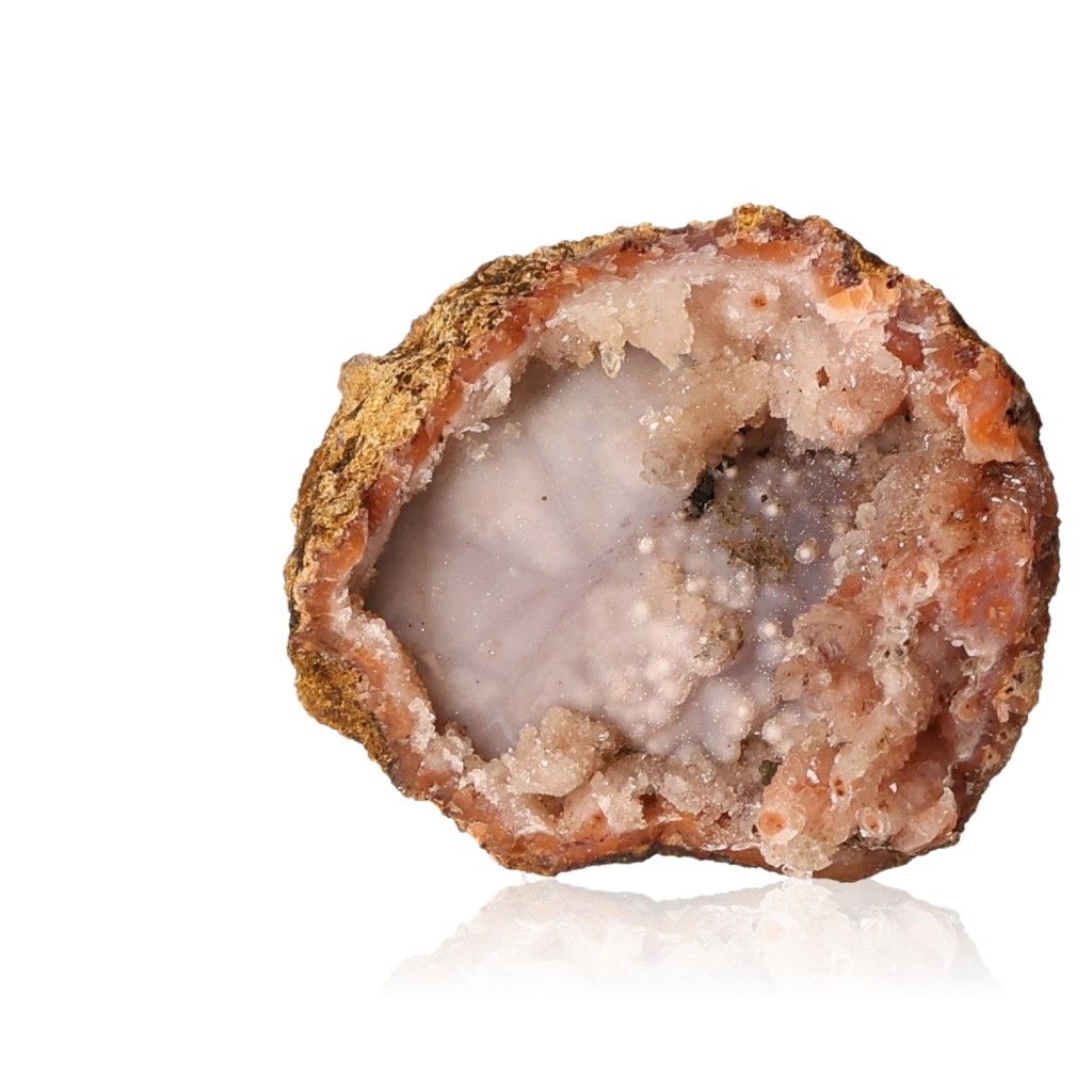 Calcite stalactite formation showcasing earthy tones and layered structure, symbolizing growth and grounding energy.