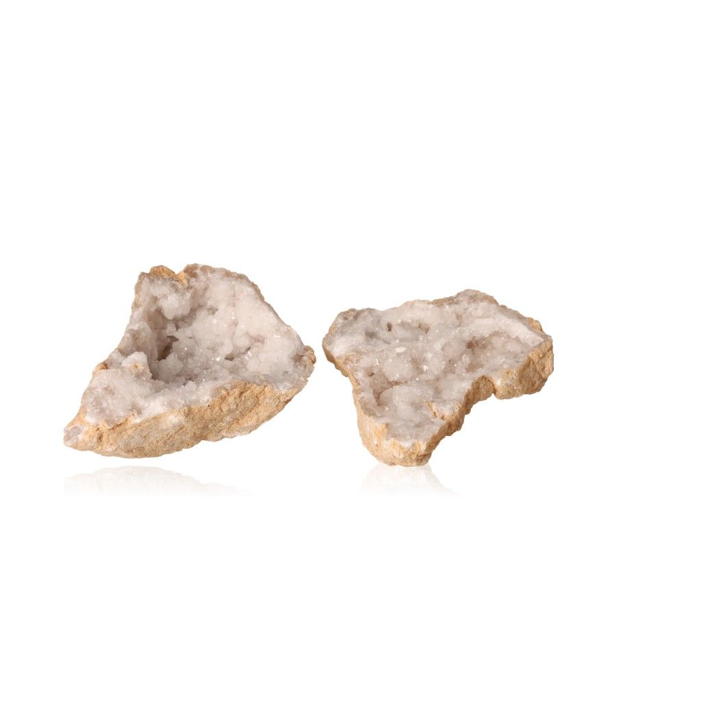 Milky quartz geode halves showing sparkling white crystals for energy balance and tranquility.