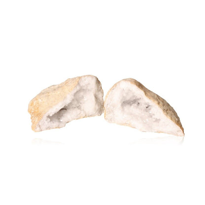 Milky quartz geode split open, revealing sparkling cloudy white crystals, perfect for enhancing tranquility and balancing energy.