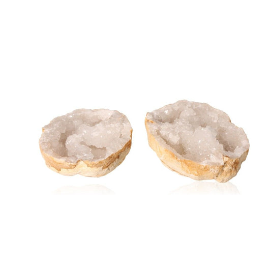 Milky quartz geode with sparkling white crystals and rugged shell, ideal for energy cleansing and promoting tranquility.