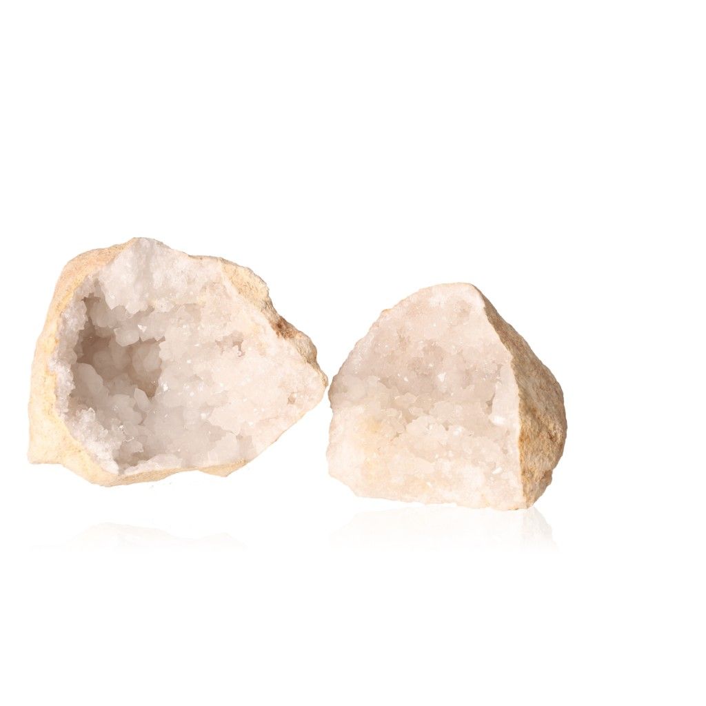 Milky quartz geodes with rugged shell and sparkling white crystals, perfect for energy balance and promoting tranquility and clarity.