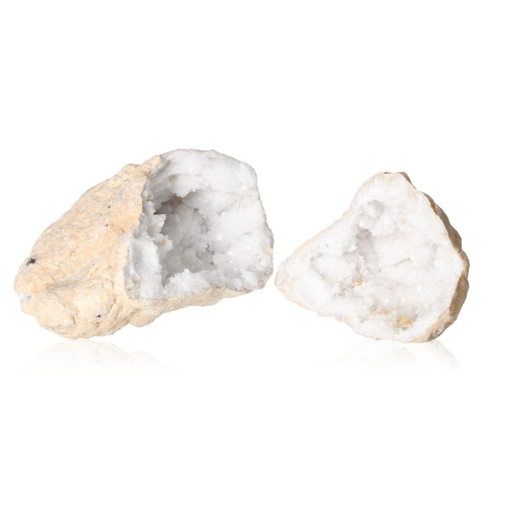 Quartz geode with milky white crystals, showcasing its rugged outer shell and sparkling interior for energy balance and tranquility.