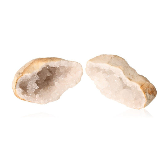 Milky quartz geode with rugged shell and sparkling white crystals for purification and energy balance.