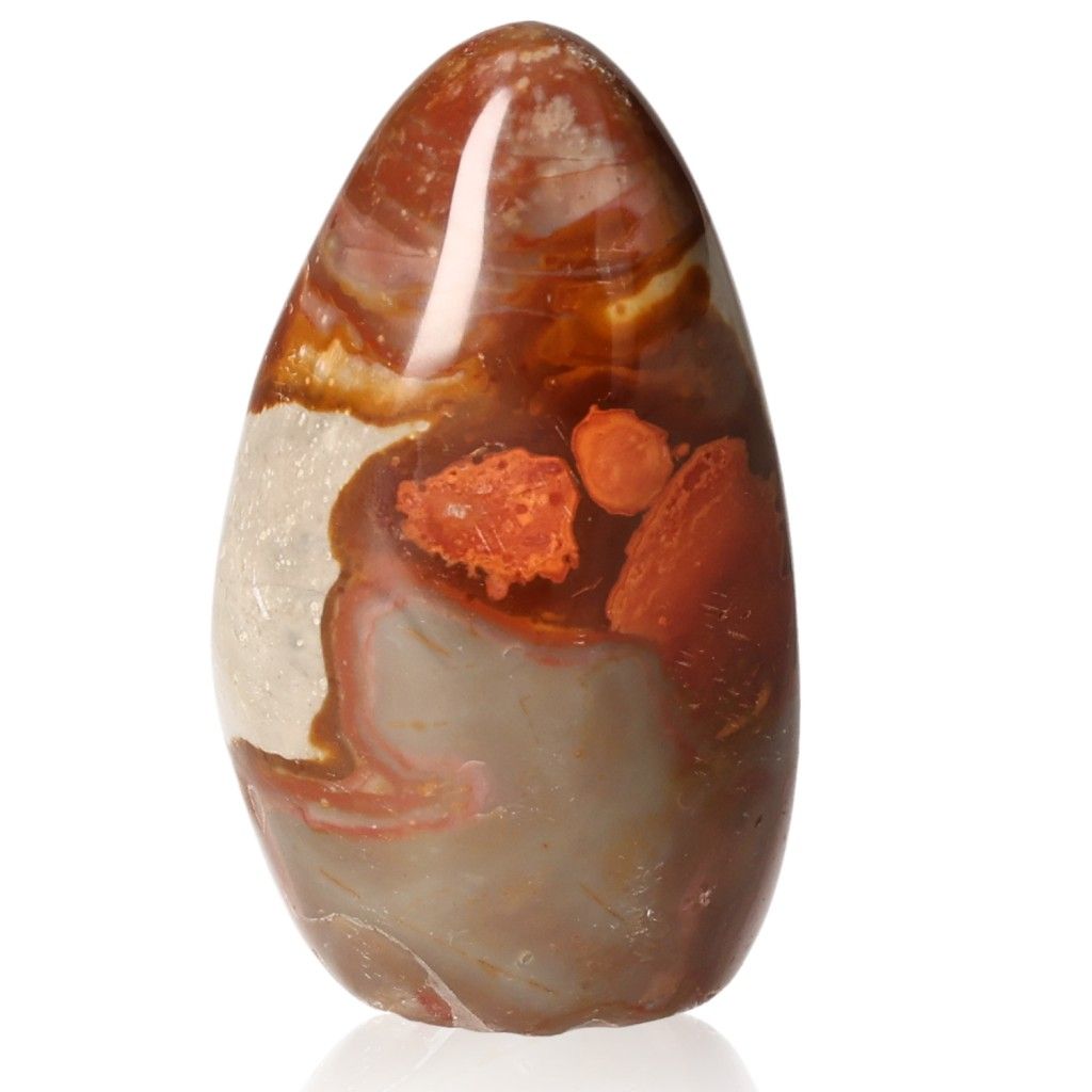 Polychrome Jasper Free Form stone with vibrant red, orange, and brown patterns, known for grounding and energizing properties.